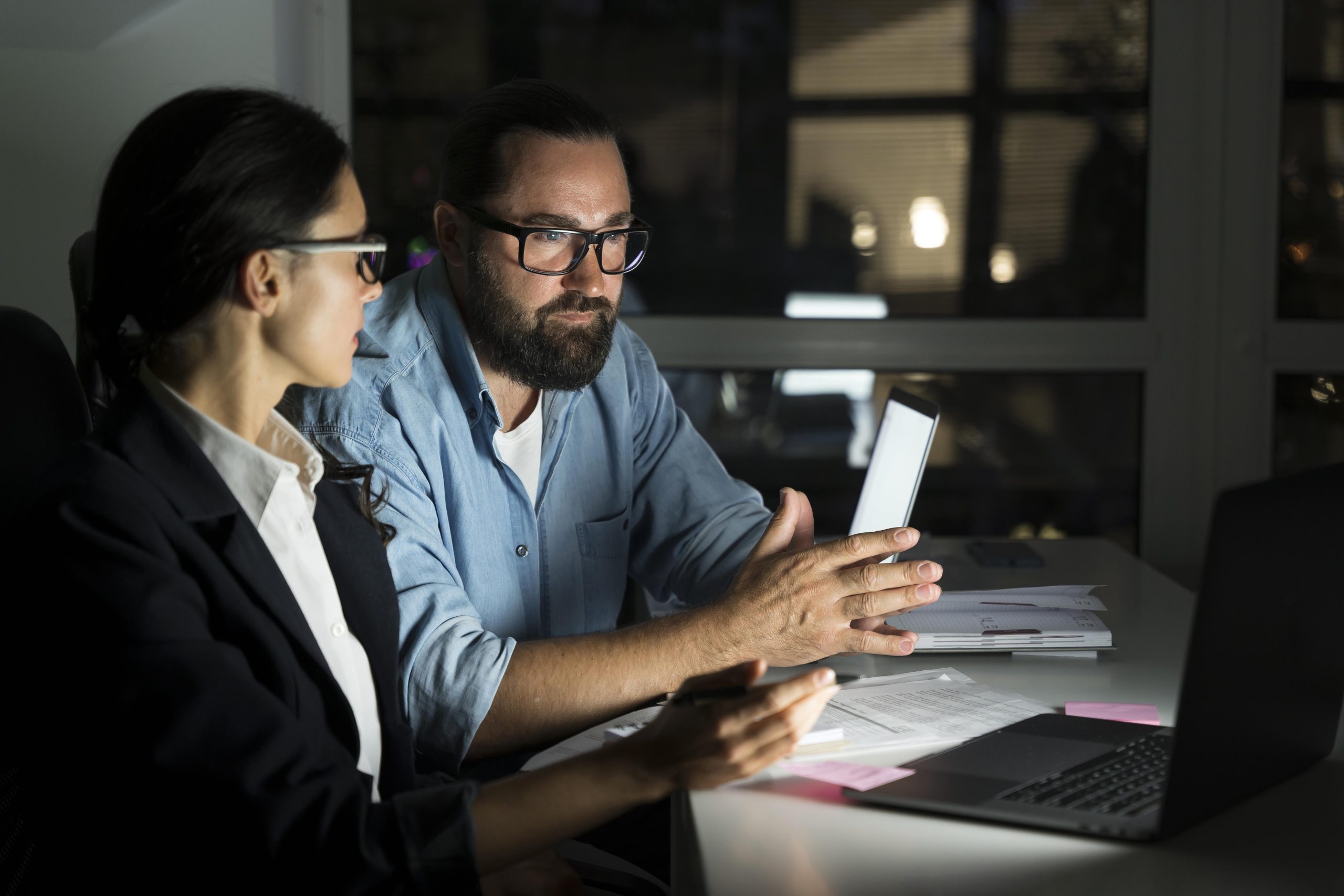 business-teammates-working-late-office-scaled