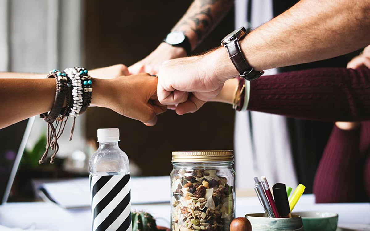 teamwork-hands-together