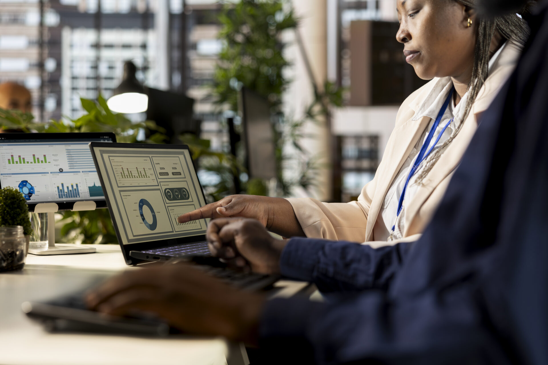 african-american-staff-gathers-examines-monthly-revenue-balance